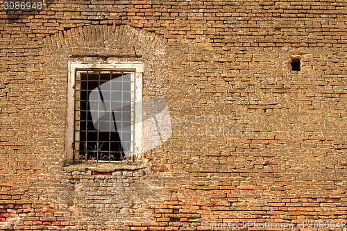Image of window on old abandoned castle wall