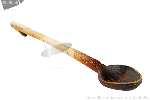 Image of old used wooden spoon