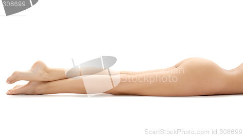 Image of long legs of relaxed lady