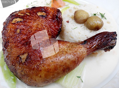 Image of Baked chicken legs with rice and vegetables