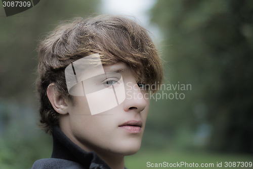 Image of moody looking young man