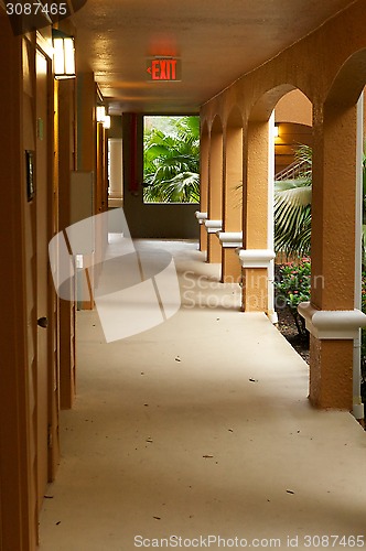 Image of outside hallway with exit sign
