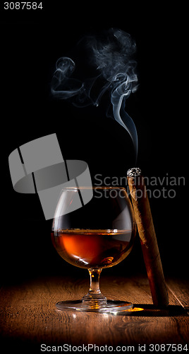 Image of Scotch and cigar