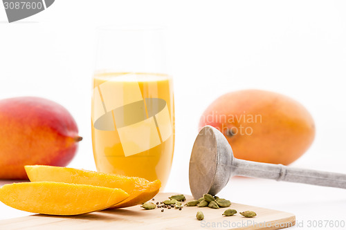 Image of Mango Flesh, Cardamom, Pestle And Mango Mocktail