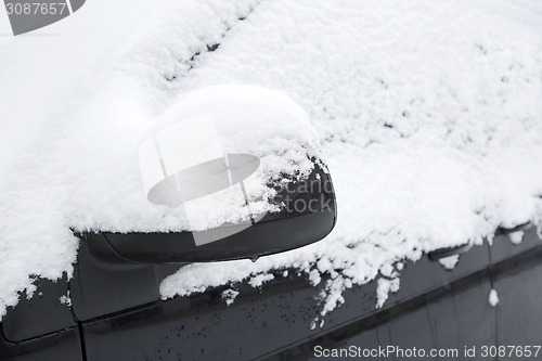 Image of Snowed car in winter