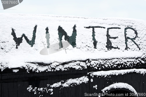 Image of Snowed car in winter