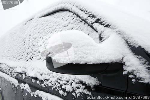 Image of Snowed car in winter