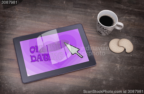 Image of Online dating on a tablet