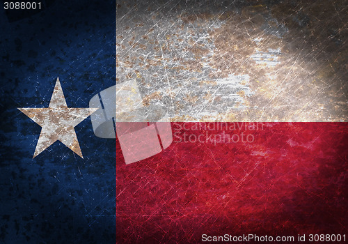 Image of Old rusty metal sign with a flag