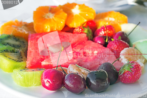 Image of Fruit dessert, diverse fruits and berries.