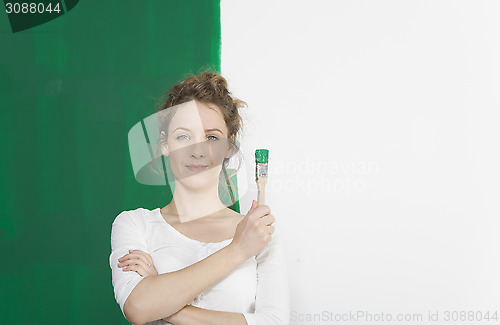 Image of Woman with green brush