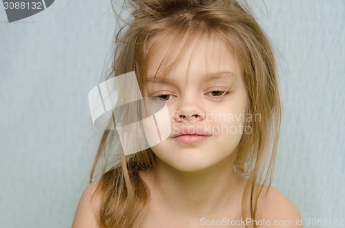 Image of Portrait of girl awakened early in the morning