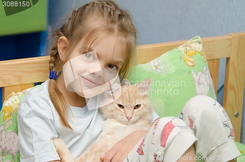 Image of Portrait of the girl with a cat