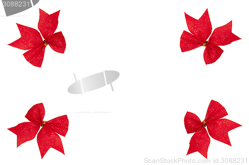 Image of Frame with red ribbon bows isolated on the white background
