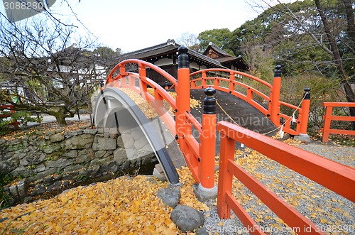 Image of Yellow leaves on the bridge in Shimogamo-jinja Shrine Kyoto 