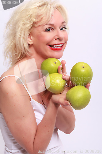 Image of Woman offers to apples