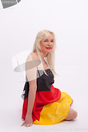 Image of Woman wrapped with Germany flag