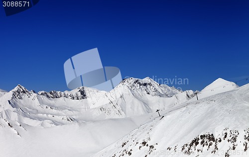 Image of Off-piste slope and ropeway in nice sun day
