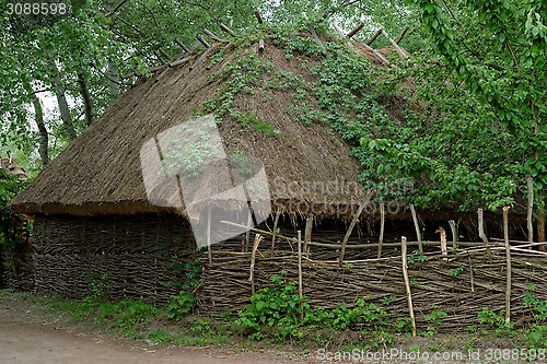 Image of Farmer's barn under the thatch roof in open air museum, Kiev, Ukraine