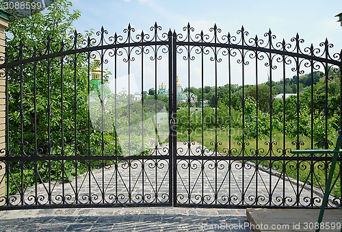 Image of Golden domes of Kiev Pechersk Lavra Monastery in Kiev, Ukraine seen through the gate