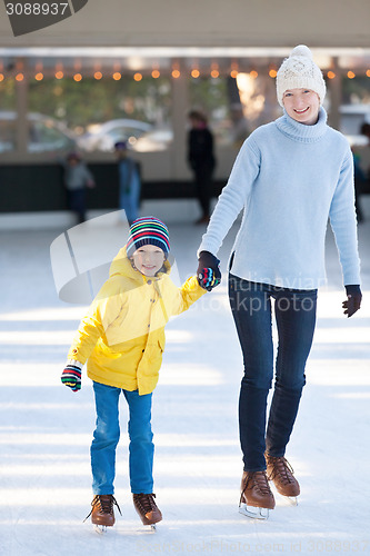 Image of family ice skating