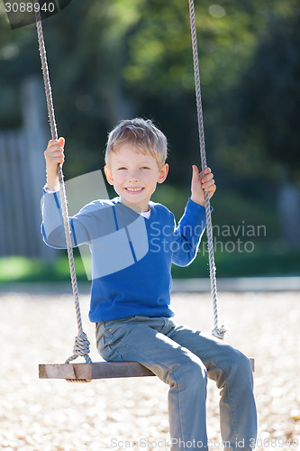 Image of boy at swings