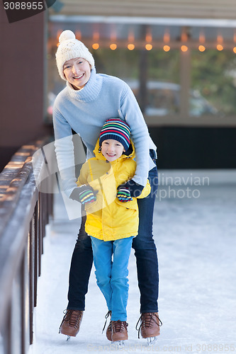 Image of family ice skating