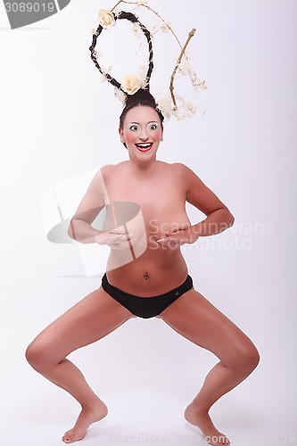 Image of Woman with extreme hair and naked body