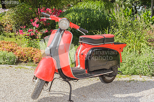 Image of Old red scooter