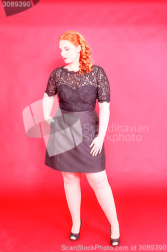 Image of Portrait of a chubby redhead