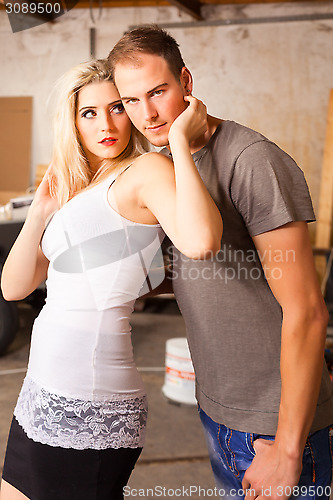 Image of Young woman exchanges of affection with a man.