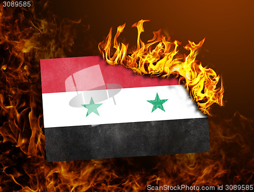 Image of Flag burning - Syria