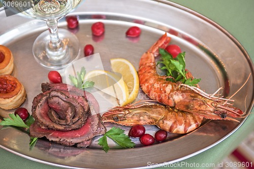 Image of Grilled shrimps and beef meat 