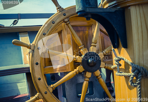 Image of Steering wheel of the ship. A workplace of the captain. Cross pr
