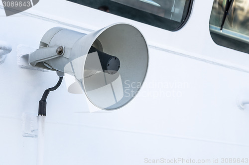 Image of Megaphone of a speaker phone on a vessel, a close up