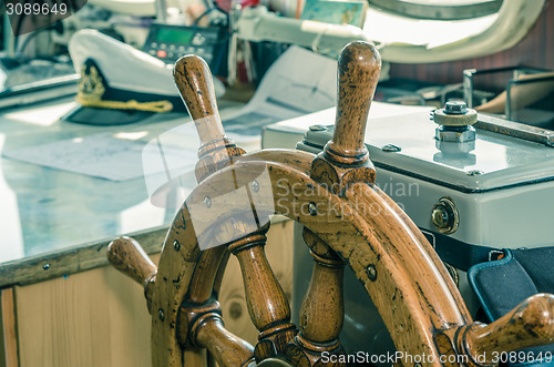 Image of Steering wheel of the ship. A workplace of the captain. Cross pr