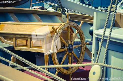 Image of Steering wheel of the ship. A workplace of the captain. Cross pr