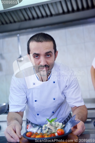 Image of chef preparing food