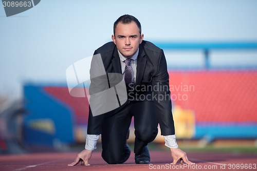 Image of business man ready to sprint