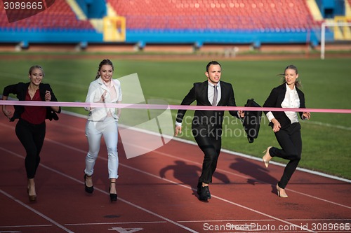 Image of business people running on racing track