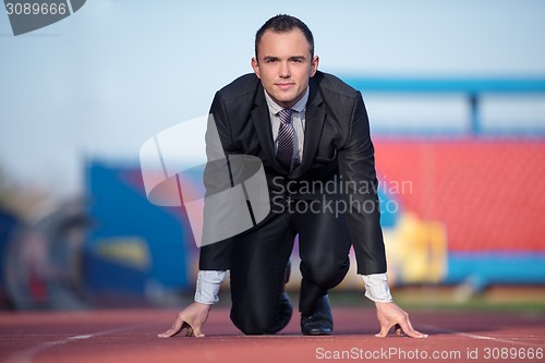 Image of business man ready to sprint