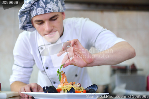 Image of chef preparing food