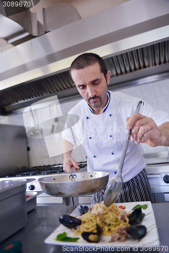 Image of chef preparing food