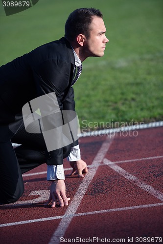 Image of business man ready to sprint