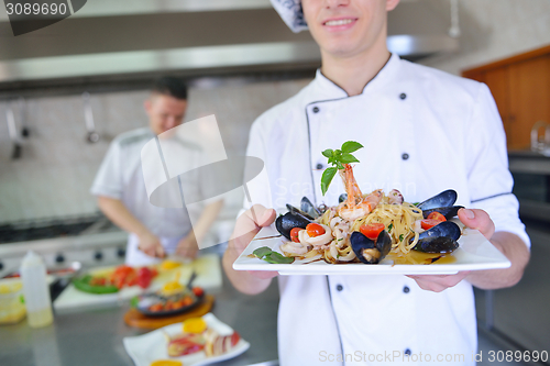 Image of chef preparing food