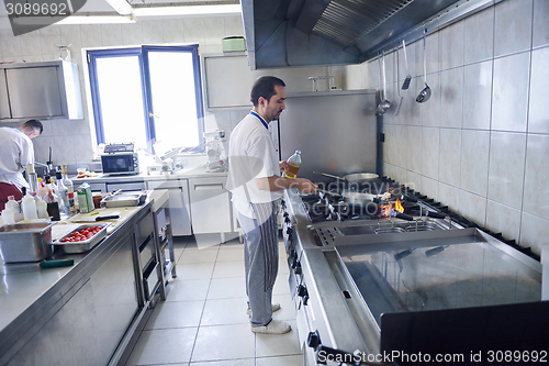 Image of chef preparing food