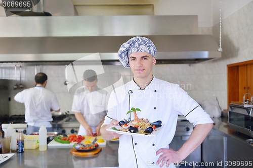 Image of chef preparing food