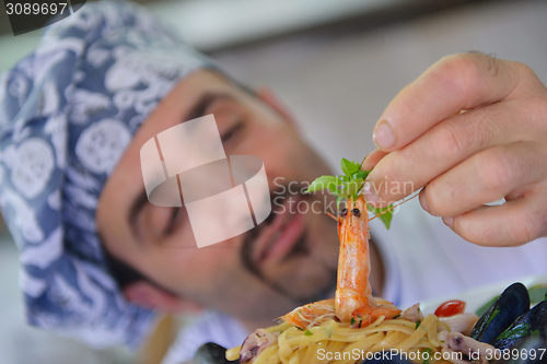 Image of chef preparing food