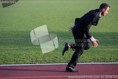 Image of business man ready to sprint