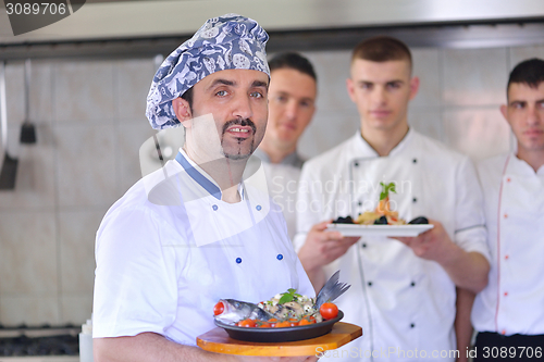 Image of chef preparing food